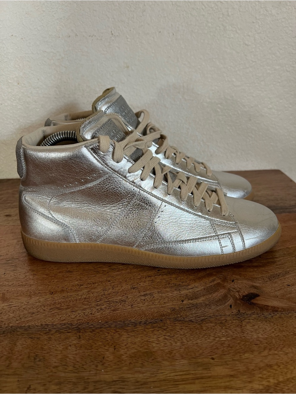 Maison Margiela
Silver Metallic High Top Sneakers Size 42